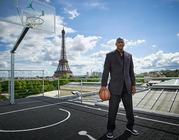 What is Michael Jordan’s Net Worth? Michael Jordan on Basketball Court in Front of Eiffel Tower