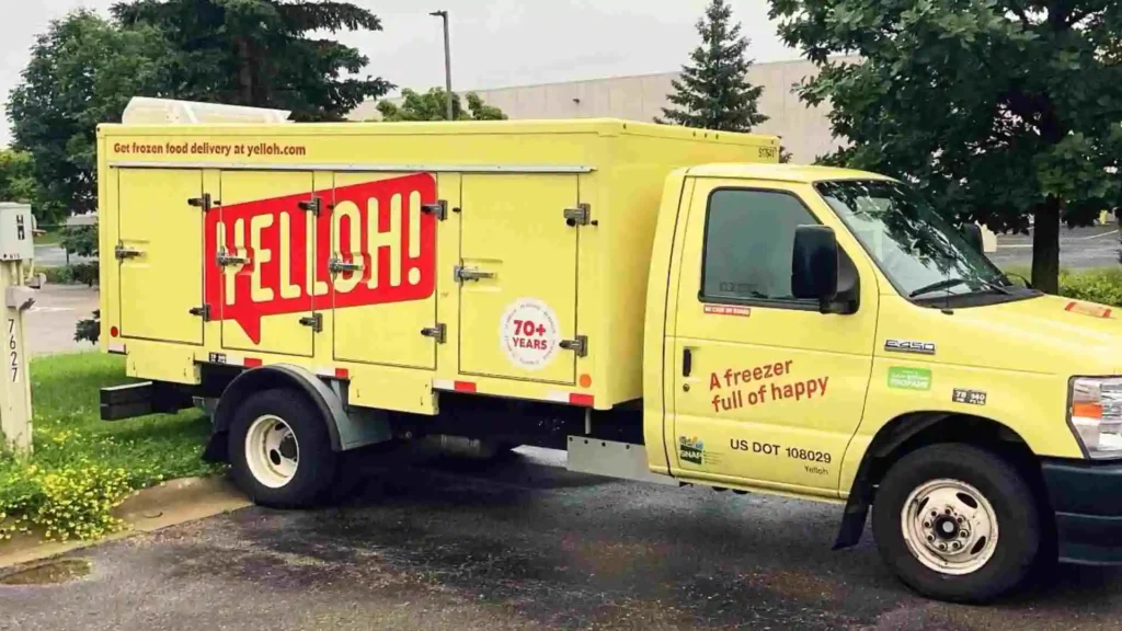 Frozen Food Company Shuts Down Operations, Chapter 11 Bankruptcy Sure to Follow A bright yellow delivery truck labeled "YELLOH!" parked on a street, advertising "Get frozen food delivery at yelloh.com" and promoting "A freezer full of happy"