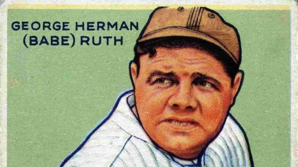 Close-up of a vintage baseball card featuring a portrait of George Herman "Babe" Ruth